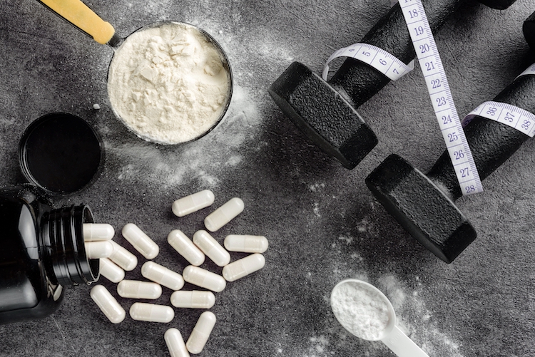 Close-up of supplements and weights