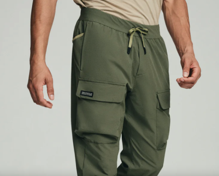Mid-torso shot of a man wearing joggers