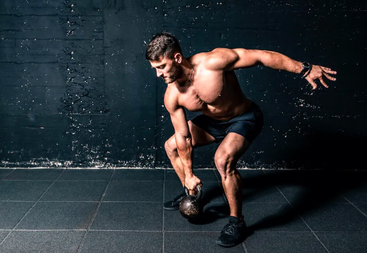 Man performing a kettlebell lift