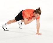 Man performing one-handed push-up