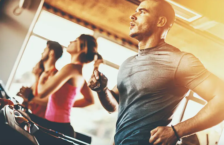 Man running on a treadmill