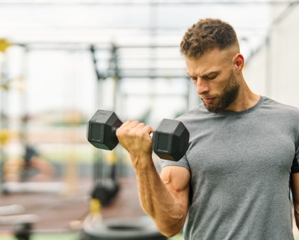 Man performing a dumbbell curl