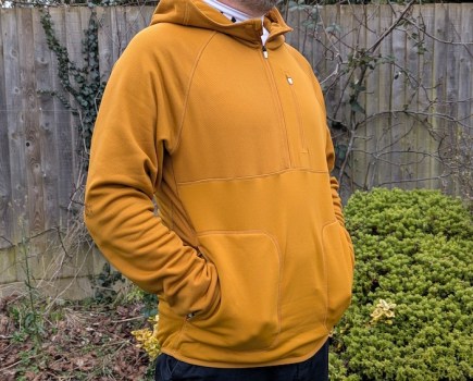 Close-up of a man wearing a brown hoodie