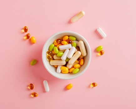 Supplements and vitamins in a bowl