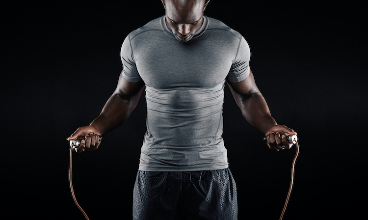 Upper torso of a man skipping