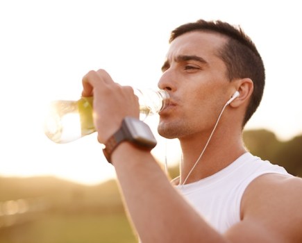 Man drinking a sports drink