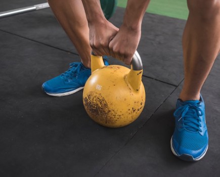 Close-up of a man's feet in gym shoes