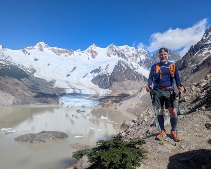 Author standing in front of a glacier in Patagonia