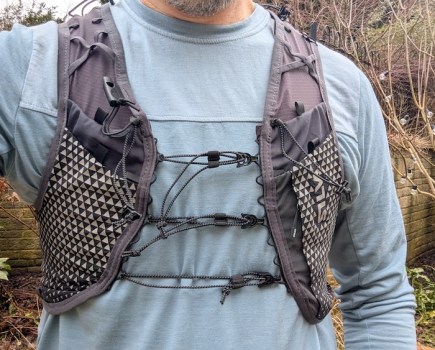 Close-up of a man wearing a running vest