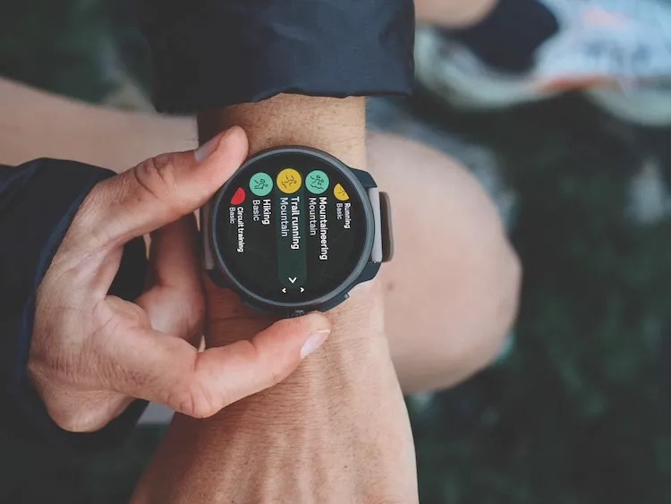 Hans operating a Suunto watch