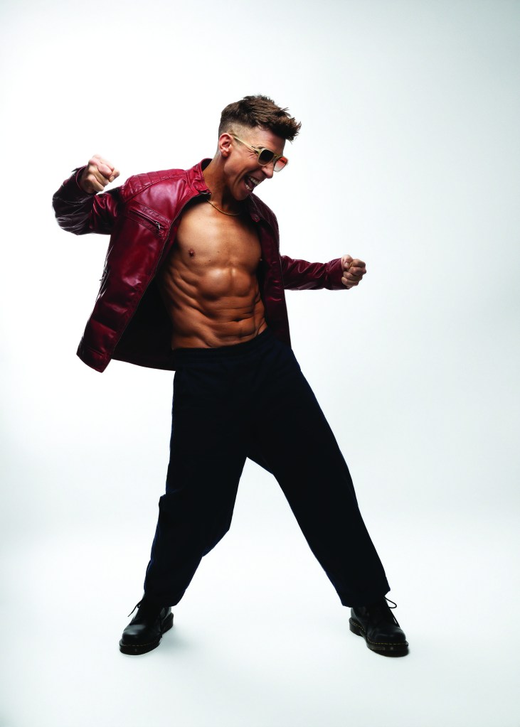 Russel Kane striking a pose on shoot.