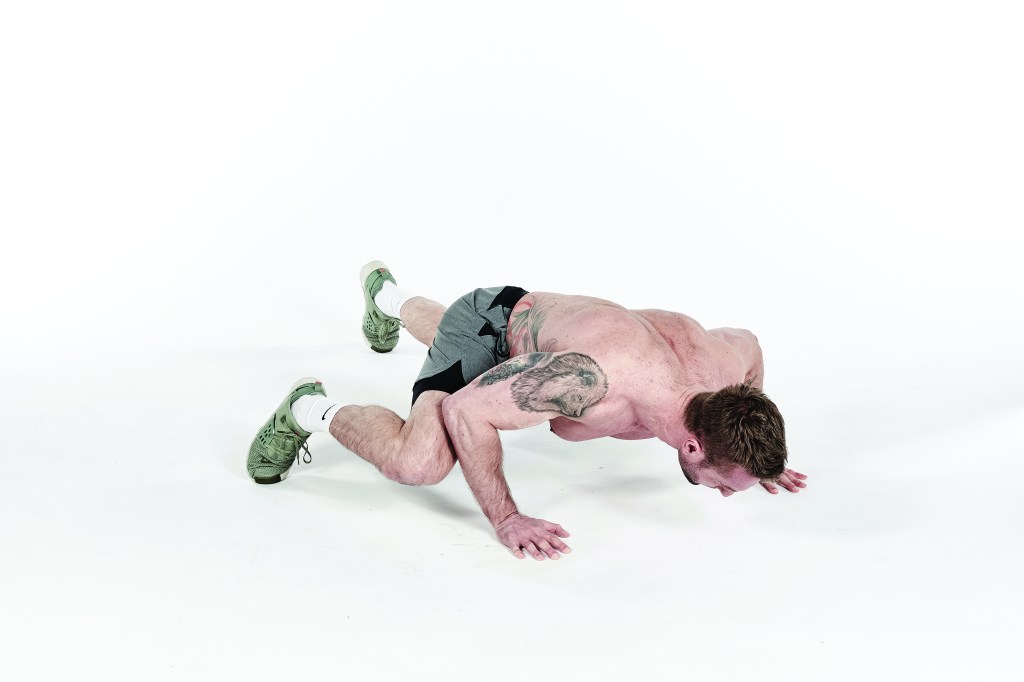 The spider-man press-up improves your hip mobility and recruit more muscles than a standard press-up